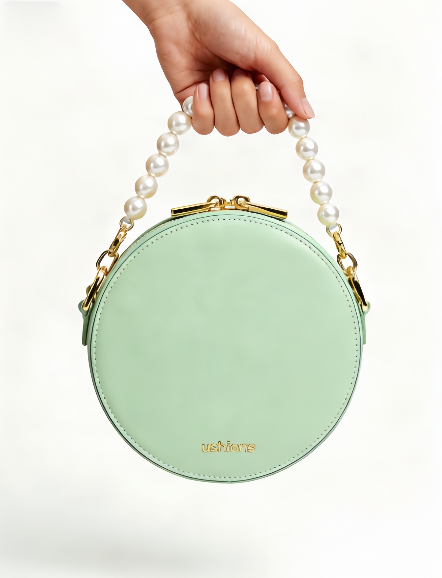 Mint Green Round Bag with Pearl Handle English Highlights