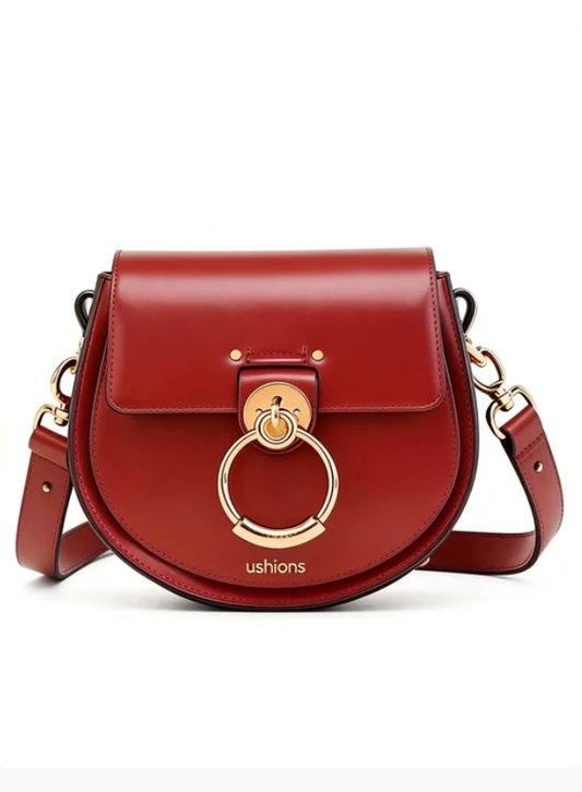 Arc in Rouge-Red Saddle Bag with Gold Circular Hardware